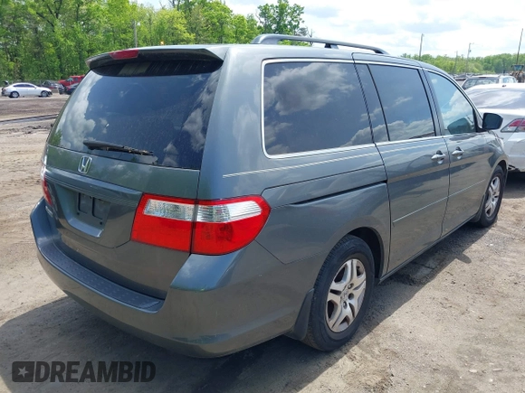 2007 Honda Odyssey EX with VIN 5FNRL38457B431016, listed as a IAAI auction lot 42155643 with 230,359 mi miles. Bid and sale history available at carsss.com. Image 4.