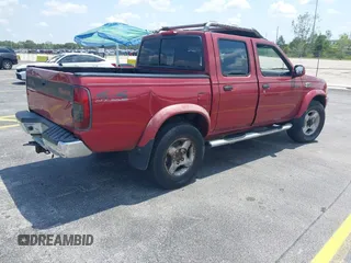 2000 Nissan Frontier XE z VIN 1N6ED27Y3YC382842, wystawiony jako IAAI lot #42343459 z przebiegiem 172 454 mil mil oraz . Historia ofert i sprzedaży dostępna na DreamBid. Obrazek 4.