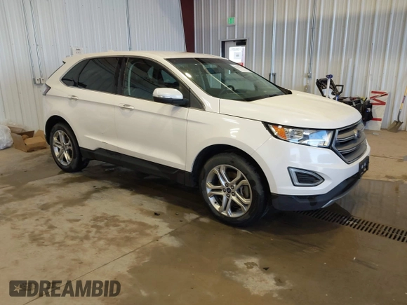 2015 Ford Edge Titanium with VIN 2FMTK4K96FBB23069, listed as a IAAI auction lot 42133761 with 171,670 mi miles. Bid and sale history available at carsss.com. Image 1.