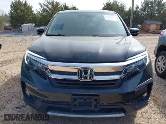 2021 Honda Pilot EX-L with VIN 5FNYF6H57MB064595, listed as a IAAI auction lot 41942327 with 46,150 mi miles and . Bid and sale history available at DreamBid. Image 12.