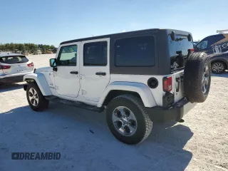 2018 Jeep Wrangler JK Unlimited Sahara with VIN 1C4HJWEG0JL929209, listed as a Copart auction lot 82971914 with 97,812 mi miles and Non Repairable. Bid and sale history available at carsss.com. Image 2.