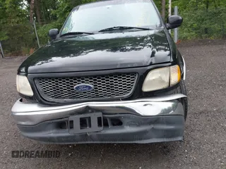 2000 Ford F-150 XL z VIN 1FTRX17L2YNB60131, wystawiony jako IAAI lot #42295537 z przebiegiem 216 638 mil mil oraz . Historia ofert i sprzedaży dostępna na DreamBid. Obrazek 12.