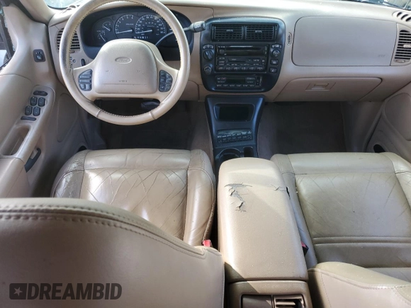 2000 Ford Explorer Eddie Bauer z VIN 1FMZU74E6YUB37521, wystawiony jako Copart lot #85994294 z przebiegiem 126 348 mil mil oraz Szkoda całkowita • Salvage title. Historia ofert i sprzedaży dostępna na DreamBid. Obrazek 8.