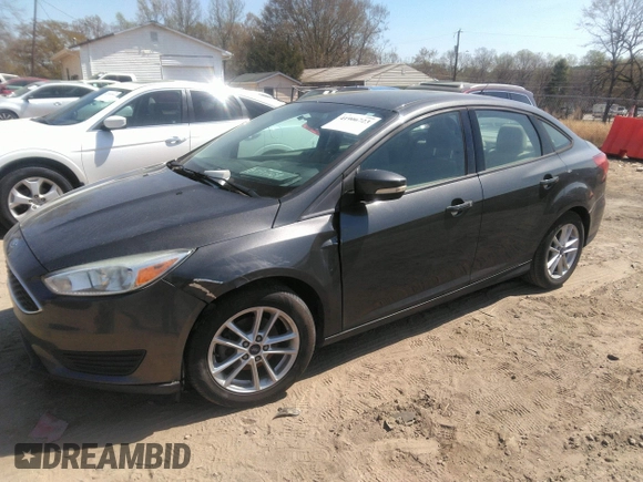 2015 Ford Focus SE with VIN 1FADP3F28FL292520, listed as a IAAI auction lot 41906723 with 74,106 mi miles. Bid and sale history available at carsss.com. Image 2.