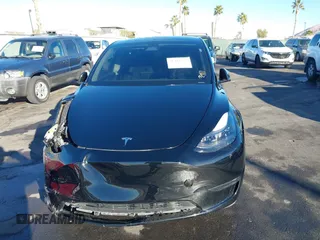 2023 Tesla Model Y Performance with VIN 7SAYGDEF6PF854797, listed as a IAAI auction lot 41319332 with 46,132 mi miles and . Bid and sale history available at DreamBid. Image 12.