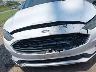 2020 Ford Fusion SE with VIN 3FA6P0HD3LR126389, listed as a IAAI auction lot 42110279 with 51,767 mi miles and . Bid and sale history available at DreamBid. Image 13.
