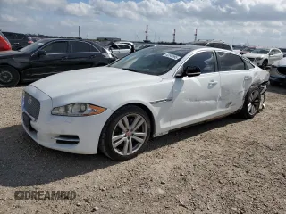 2014 Jaguar XJ with VIN SAJWA2GZ3E8V70365, listed as a Copart auction lot 42545995 with 65,649 mi miles and Salvage Title. Bid and sale history available at carsss.com. Image 1.