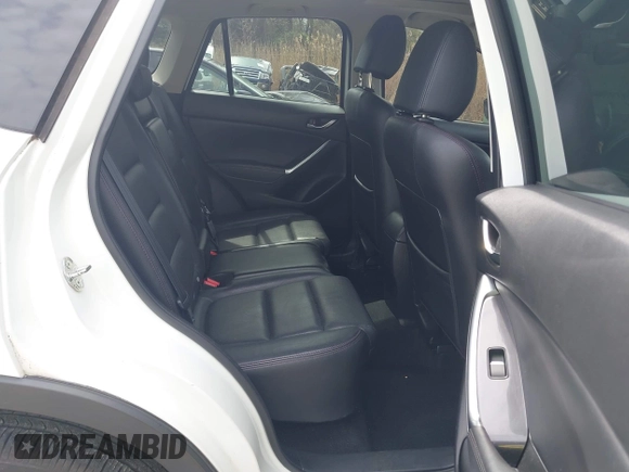 2016 Mazda CX-5 Grand Touring with VIN JM3KE4DY6G0618121, listed as a IAAI auction lot 41958805 with 101,232 mi miles. Bid and sale history available at carsss.com. Image 8.