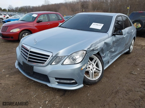 2013 Mercedes-Benz E-Class E 350 Luxury with VIN WDDHF8JB5DA678944, listed as a IAAI auction lot 41208242 with 101,834 mi miles. Bid and sale history available at carsss.com. Image 2.