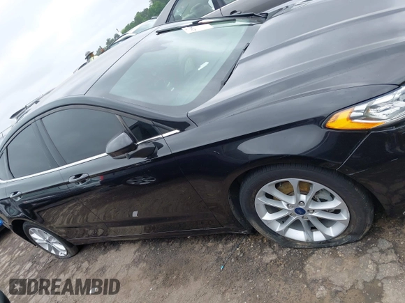 2020 Ford Fusion SE z VIN 3FA6P0HD5LR178607, wystawiony jako IAAI lot #42094774 z przebiegiem 123 341 mil mil oraz . Historia ofert i sprzedaży dostępna na DreamBid. Obrazek 12.