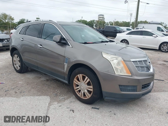 2012 Cadillac SRX Luxury Collection z VIN 3GYFNAE35CS509402, wystawiony jako IAAI lot #41765970 z przebiegiem 157 082 mil mil oraz . Historia ofert i sprzedaży dostępna na DreamBid. Obrazek 1.