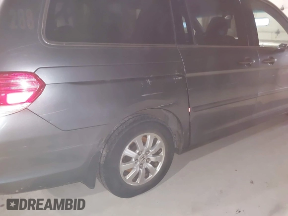 2010 Honda Odyssey EX-L with VIN 5FNRL3H78AB030111, listed as a IAAI auction lot 41250121 with 333,030 mi miles and . Bid and sale history available at DreamBid. Image 12.