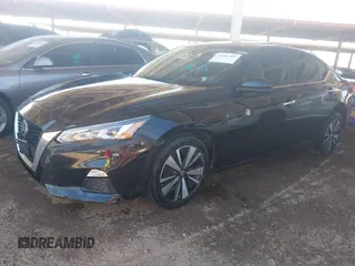 2022 Nissan Altima SV with VIN 1N4BL4DW5NN309758, listed as a IAAI auction lot 42101369 with 100,317 mi miles and . Bid and sale history available at DreamBid. Image 2.