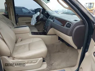 2014 GMC Yukon XL Denali with VIN 1GKS2MEF8ER239777, listed as a IAAI auction lot 41192009 with 142,656 mi miles. Bid and sale history available at carsss.com. Image 5.