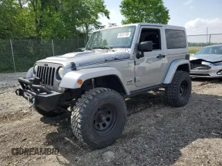 2014 Jeep Wrangler Sahara with VIN 1C4AJWBG0EL241643, listed as a Copart auction lot 56491155 with 113,596 mi miles and Salvage title. Bid and sale history available at DreamBid. Image 1.