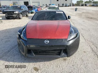 2014 Nissan 370Z z VIN JN1AZ4EH9EM636239, wystawiony jako Copart lot #69833264 z przebiegiem 110 802 mil mil oraz Szkoda całkowita • Salvage title. Historia ofert i sprzedaży dostępna na DreamBid. Obrazek 5.