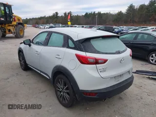 2016 Mazda CX-3 Grand Touring with VIN JM1DKFD7XG0132084, listed as a IAAI auction lot 41004954 with 70,476 mi miles. Bid and sale history available at carsss.com. Image 3.