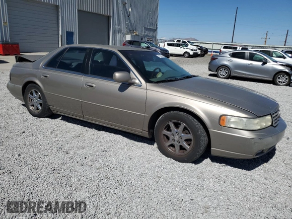 2000 Cadillac Seville Touring STS z VIN 1G6KY5498YU255607, wystawiony jako Copart lot #71130714 z przebiegiem 146 046 mil mil oraz Szkoda całkowita • Salvage title. Historia ofert i sprzedaży dostępna na DreamBid. Obrazek 4.