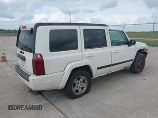 2008 Jeep Commander Sport z VIN 1J8HH48KX8C115328, wystawiony jako IAAI lot #42139929 z przebiegiem 118 218 mil mil oraz . Historia ofert i sprzedaży dostępna na DreamBid. Obrazek 4.