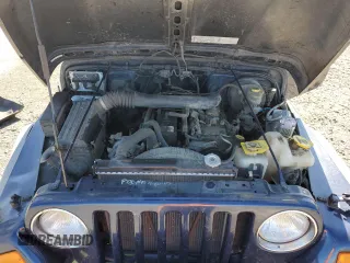 2003 Jeep Wrangler Sport with VIN 1J4FA49S63P361676, listed as a Copart auction lot 59054905 with 123,184 mi miles and Salvage title. Bid and sale history available at DreamBid. Image 11.