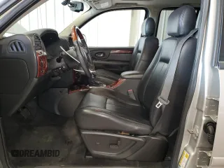 2008 GMC Envoy Denali with VIN 1GKET63M682243721, listed as a Copart auction lot 75963404 with 163,178 mi miles and Salvage Title. Bid and sale history available at carsss.com. Image 7.