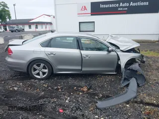 2013 Volkswagen Passat SE with VIN 1VWBP7A33DC041410, listed as a IAAI auction lot 42427033 with Not provided miles and . Bid and sale history available at DreamBid. Image 13.