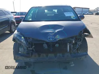 2014 Toyota Sienna SE with VIN 5TDXK3DC7ES482954, listed as a IAAI auction lot 41197465 with 160,107 mi miles and . Bid and sale history available at DreamBid. Image 6.