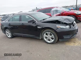 2014 Ford Taurus SEL z VIN 1FAHP2E85EG121636, wystawiony jako IAAI lot #41036886 z przebiegiem 117 460 mil mil oraz . Historia ofert i sprzedaży dostępna na DreamBid. Obrazek 13.