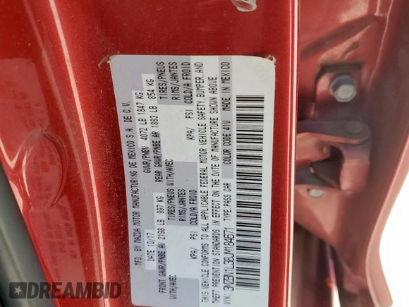2018 Mazda 3 Touring with VIN 3MZBN1L38JM184671, listed as a Copart auction lot 52008405 with 114,292 mi miles and Salvage Title. Bid and sale history available at DreamBid. Image 12.