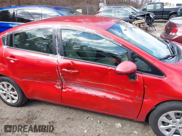 2014 Kia Rio LX with VIN KNADM4A31E6370963, listed as a IAAI auction lot 41720980 with 112,551 mi miles and . Bid and sale history available at DreamBid. Image 6.