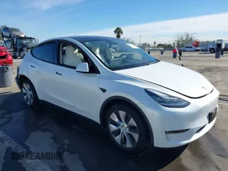 2021 Tesla Model Y Standard Range with VIN 5YJYGDED4MF162982, listed as a IAAI auction lot 41378674 with 60,267 mi miles. Bid and sale history available at carsss.com. Image 1.