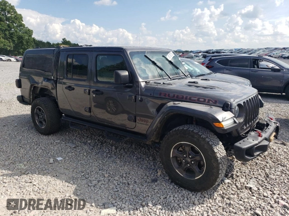 2021 Jeep Gladiator Rubicon with VIN 1C6JJTBG3ML602478, listed as a Copart auction lot 58138705 with 76,759 mi miles and Salvage title. Bid and sale history available at DreamBid. Image 4.