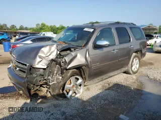 2011 Chevrolet Tahoe LS with VIN 1GNSCAE00BR395849, listed as a Copart auction lot 54750685 with 183,336 mi miles and Salvage title. Bid and sale history available at DreamBid. Image 1.