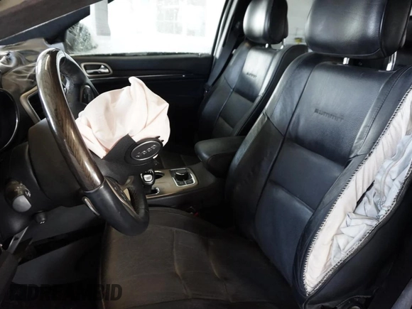 2014 Jeep Grand Cherokee Summit с VIN 1C4RJFJG5EC340768, выставлен на аукционе Copart как лот 48050645 с пробегом 119 377 миль миль и Списание • Salvage title. История ставок и продаж доступна на DreamBid. Изображение 9.