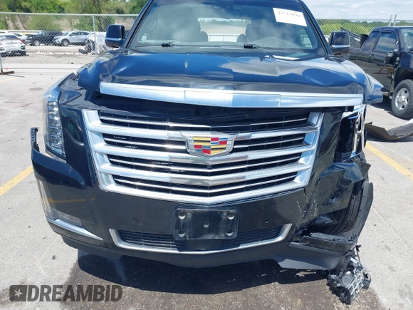 2015 Cadillac Escalade Platinum z VIN 1GYS4PKJ8FR568958, wystawiony jako IAAI lot #42316098 z przebiegiem 152 661 mil mil oraz . Historia ofert i sprzedaży dostępna na DreamBid. Obrazek 6.