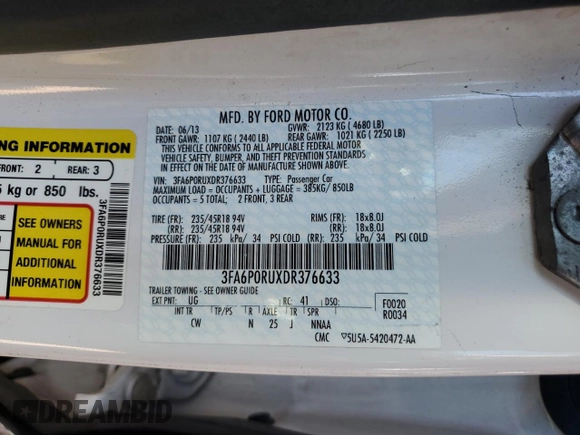 2013 Ford Fusion Titanium Hybrid z VIN 3FA6P0RUXDR376633, wystawiony jako Copart lot #57685555 z przebiegiem 133 248 mil mil oraz Szkoda całkowita • Salvage title. Historia ofert i sprzedaży dostępna na DreamBid. Obrazek 12.