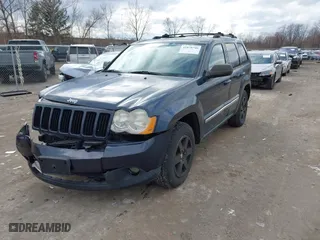 2010 Jeep Grand Cherokee Laredo with VIN 1J4PR4GK5AC138498, listed as a IAAI auction lot 41870740 with 130,551 mi miles. Bid and sale history available at carsss.com. Image 2.