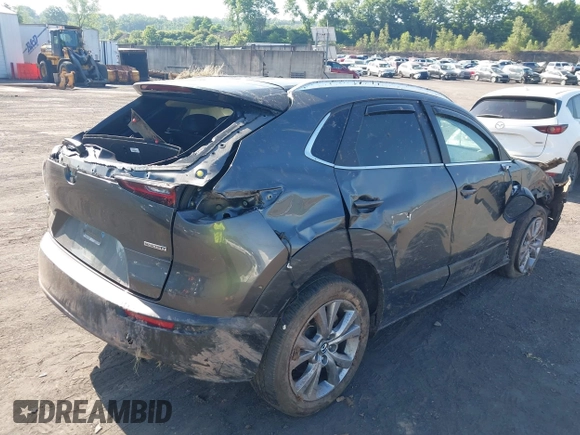 2023 Mazda CX-30 S Carbon Edition with VIN 3MVDMBCM6PM510231, listed as a IAAI auction lot 42579591 with 29,240 mi miles and . Bid and sale history available at DreamBid. Image 4.