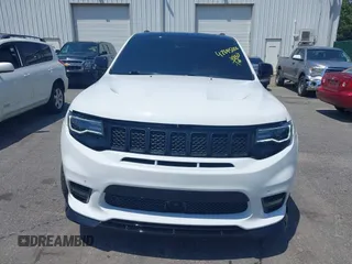 2019 Jeep Grand Cherokee Summit with VIN 1C4RJFJT1KC785744, listed as a IAAI auction lot 42645006 with 38,483 mi miles and . Bid and sale history available at DreamBid. Image 12.