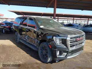 2024 GMC Yukon XL SLT with VIN 1GKS2GKD2RR157523, listed as a IAAI auction lot 41600219 with 52,444 mi miles. Bid and sale history available at carsss.com. Image 1.