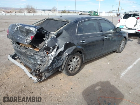 2009 Toyota Avalon XL with VIN 4T1BK36B59U325810, listed as a IAAI auction lot 41337809 with 184,476 mi miles. Bid and sale history available at carsss.com. Image 4.