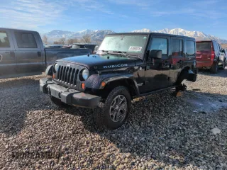 2013 Jeep Wrangler Unlimited Rubicon 10th Anniversary with VIN 1C4HJWFG6DL557085, listed as a Copart auction lot 41693075 with 139,240 mi miles and Salvage title. Bid and sale history available at DreamBid. Image 1.