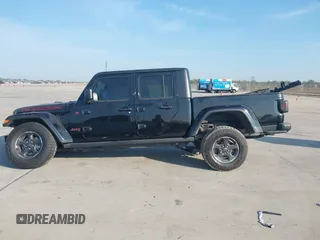 2023 Jeep Gladiator Rubicon z VIN 1C6JJTBGXPL543787, wystawiony jako IAAI lot #40963799 z przebiegiem 5 402 mil mil oraz . Historia ofert i sprzedaży dostępna na DreamBid. Obrazek 15.