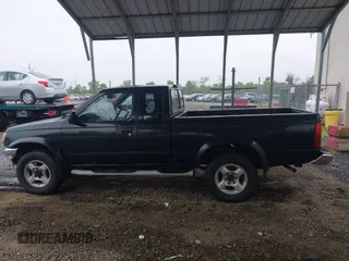 2000 Nissan Frontier XE z VIN 1N6ED26Y6YC328713, wystawiony jako IAAI lot #42314409 z przebiegiem 134 340 mil mil oraz . Historia ofert i sprzedaży dostępna na DreamBid. Obrazek 14.