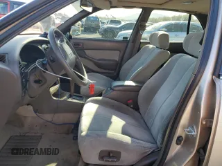 1994 Toyota Camry XLE with VIN JT2GK13E0R0017831, listed as a Copart auction lot 49887485 with 143,303 mi miles and Salvage Title. Bid and sale history available at carsss.com. Image 7.