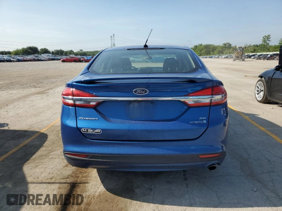 2017 Ford Fusion Hybrid SE with VIN 3FA6P0LU3HR234056, listed as a Copart auction lot 61430935 with 142,164 mi miles and Salvage title. Bid and sale history available at DreamBid. Image 6.