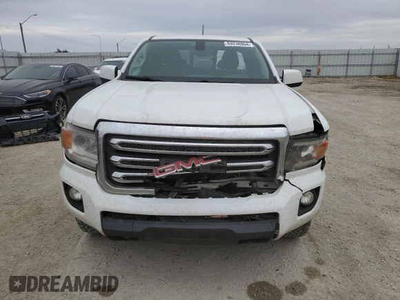 2015 GMC Canyon 4WD SLE with VIN 1GTH6BE38F1193615, listed as a Copart auction lot 69236954 with 201,201 mi miles and Salvage Title. Bid and sale history available at carsss.com. Image 5.