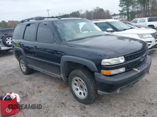 2005 Chevrolet Tahoe LT z VIN 1GNEK13T55R124691, wystawiony jako IAAI lot #41103287 z przebiegiem 232 296 mil mil oraz . Historia ofert i sprzedaży dostępna na DreamBid. Obrazek 1.