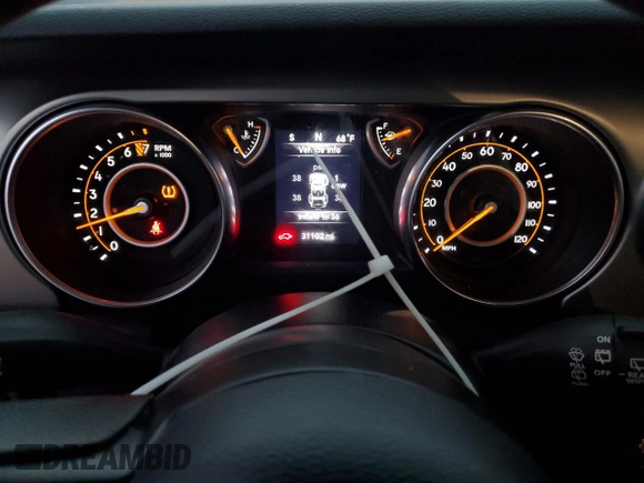 2021 Jeep Wrangler Sport with VIN 1C4GJXAGXMW701082, listed as a Copart auction lot 80138224 with 31,102 mi miles and Salvage Title. Bid and sale history available at DreamBid. Image 9.