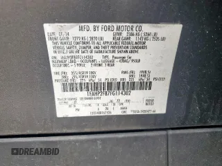 2015 Ford Taurus Limited with VIN 1FAHP2F87FG114302, listed as a Copart auction lot 62407335 with 162,107 mi miles and Salvage title. Bid and sale history available at DreamBid. Image 12.